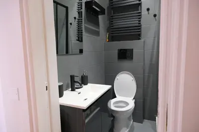 a small bathroom with a toilet and a sink at Casa Frida Arte e Sport tra MAXXI e Olimpico in Rome