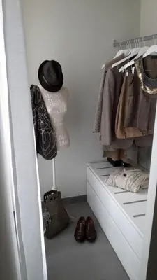 a walk in closet with shoes and a hat at Guest House Sinfonia sul Tevere in Rome