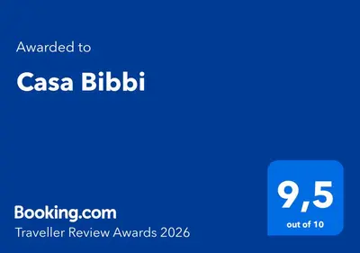 a blue sign with the text cancelled to casa bibliography at Casa Bibbi in Rome