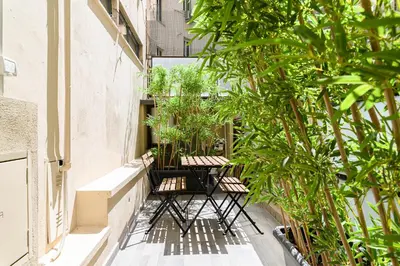 a bathroom with a sink and a mirror at New Modern in Trastevere with Garden in Rome