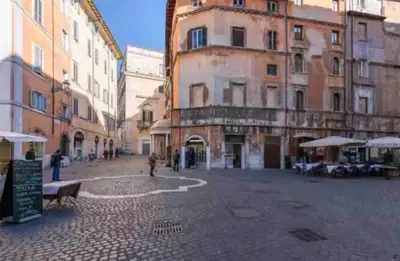 an empty street in an old town with buildings at Loft in the Ghetto in Rome