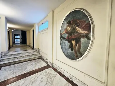 a painting on a wall in a hallway at Gabri 19 - Elegant Escape in Piazzale Flaminio in Rome
