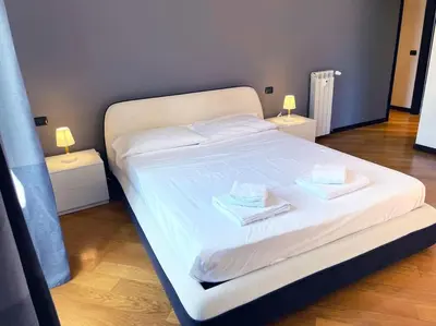 two beds with white towels on top of them at Casa Beatriz - Amazing Apartment in Rome in Rome
