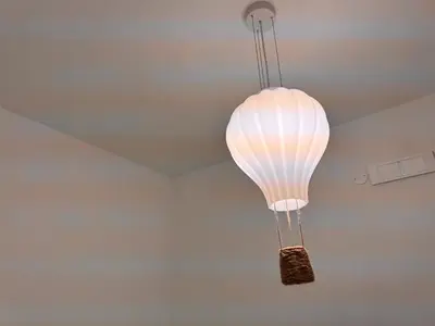a light fixture hanging from a ceiling at GIUBILEO PALACE Inn in Rome