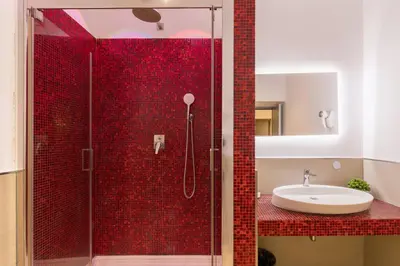 a bathroom with a shower and a sink at Merulana 43 - Guest House in Rome