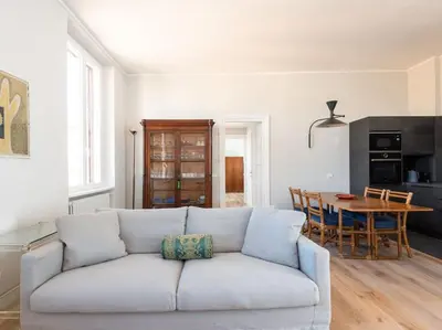 a living room with a couch and a table at Vatican Luxury Apartment in Rome
