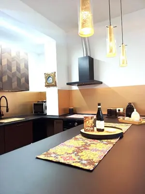 a kitchen with a table with a plate of food on it at Soraya Home in Rome