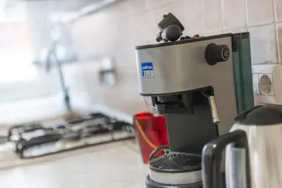 a coffee maker on a counter in a kitchen at Trastevere - Monteverde Apartment in Rome