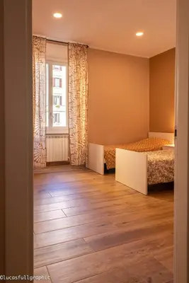 a room with two beds and a window at Sophie's choice 3 e Sophie's choice 4 in Rome