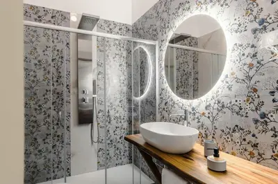 a bathroom with a sink and a mirror at BeB Domus Arbenzio San Giovanni Suite in Rome