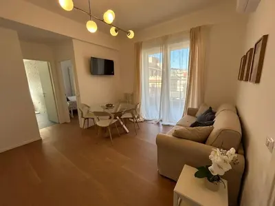 a living room with a couch and a table at Momenti di felicità a Roma in Rome