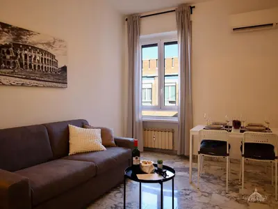 a living room with a couch and a table at Gregory Retreat in Rome
