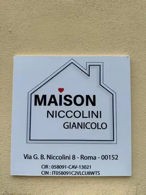 a sign on a wall with the name of a mosque at Maison Niccolini Gianicolo in Rome