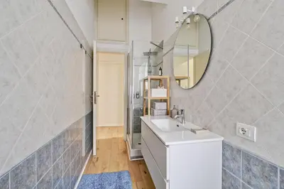 a bathroom with a sink and a mirror at Boncompagni79 design & comfort in the City Center Villa Borghese in Rome