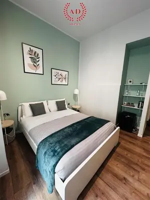 a bedroom with a large bed in a room at AD 111 ColaDiRienzo Rooms - by AD Roma in Rome