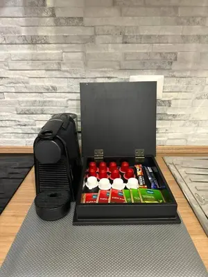 a black container filled with lots of differentiatesiatesiatesiatesiatesktop at Nina's Apartment with terrace Rome Monteverde in Rome