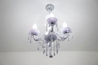 a chandelier hanging from a ceiling at Olimpia House - Gianicolense in Rome