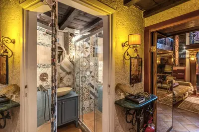 a bathroom with a shower and a sink at The Eleanor Secret Studio - Campo de' Fiori in Rome