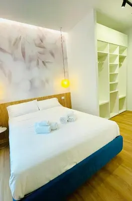 a bedroom with a bed with towels on it at Rome Riverside Retreat in Rome