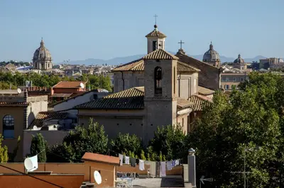 a view of a city with a church at Tiberim Lux Penthouse City View in Rome