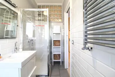 a bathroom with a shower and a sink at Casa di Lola Metro Conca d' Oro in Rome