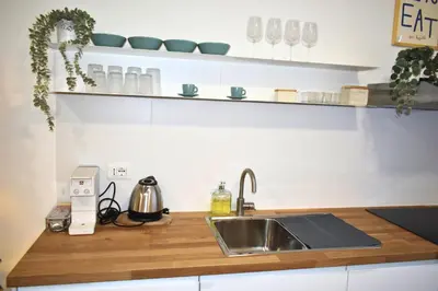 a kitchen with a sink and a counter top at Dimora Artis by Gialel in Rome