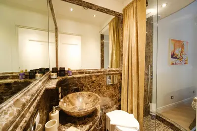 a bathroom with a sink and a shower at Ad un passo da San Pietro in Rome