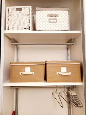 a closet with shelves with boxes and utensils at Lovely Flat Roma Università in Rome