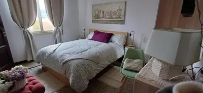 a small bedroom with a bed and a window at Casetta clodio in Rome