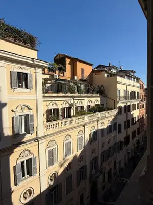 a building with balconies on the side of it at Two Bedrooms Spanish Steps Apartment in Rome