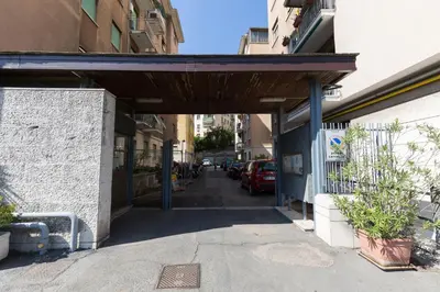 a building with an awning over a street at Casa Vacanze La Bomboniera in Rome