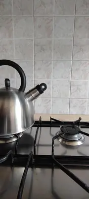 a tea kettle sitting on top of a stove at CasAppia in Rome
