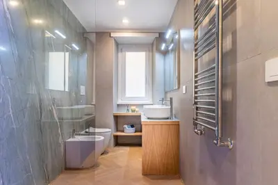a bathroom with a toilet and a sink and a shower at Cyprus - Roma's Delightful Lodges in Rome