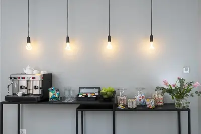 a kitchen counter with a coffee maker and fruit on it at Corso Vittorio 308 in Rome