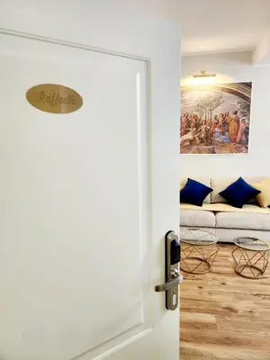 a bathroom with two sinks and a shower at Golden Palace Luxury Guest House in Rome