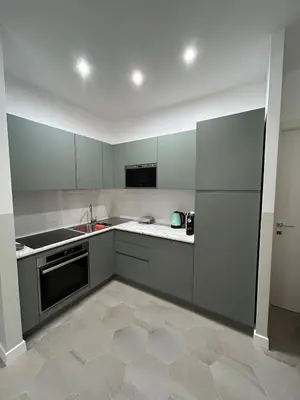 a kitchen with a sink and a stove at Casa Roma Metro B Tiburtina in Rome