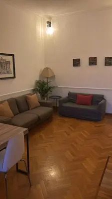 a living room with a couch and a table at loft 06 - new opening in Rome