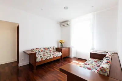 a living room with a couch and a table at Casa 901 - The Italian Stay Collection in Rome