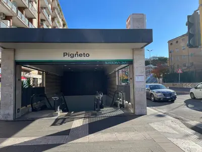 a parking garage with two parking meters in it at il giardino di frida in Rome
