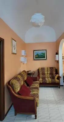 a living room with two couches and a couch at BnB Rooms And Comfort in Rome