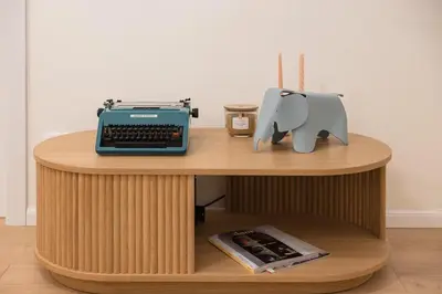 a desk with a laptop and an elephant on it at Trionfale Home in Rome