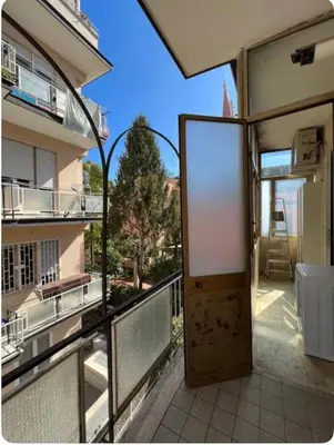 an open door to a balcony in a building at Maison del Forte Boccea 108 in Rome