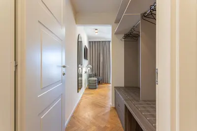 a bedroom with a canopy bed and a window at Arenula16 - Attico con terrazza panoramica in Rome