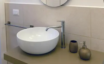 a bathroom sink with a white bowl on a counter at Gioia di Roma in Rome