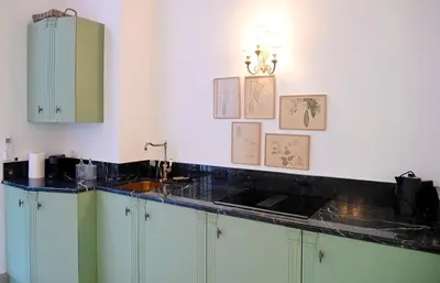 a bedroom with a large bed with towels on it at Romantic Silent Garden in Rome