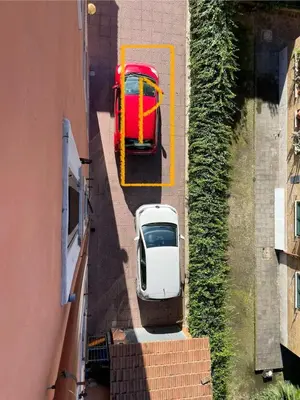 an overhead view of a white car parked next to a red car at Mazzoni Suite, Panoramic Terrace and Comfort in Rome