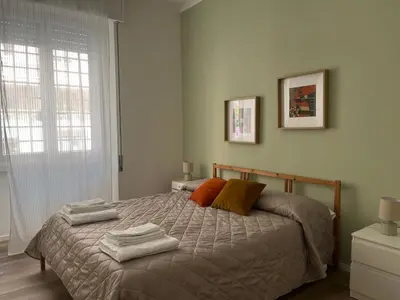 a bedroom with a bed with towels on it at Casa Giovi in Rome