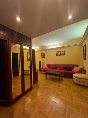 a living room with a couch and a table at Tatyana appartament in Rome
