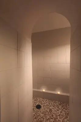 a room with a shower with a tile floor at Principessa Trevi in Rome