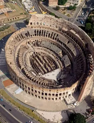 an aerial view of an amphitheater in a city at COLOSS IMPERIAL SUITE Guest House in Rome